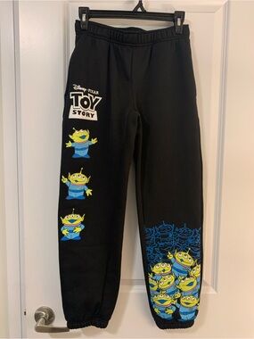 Disney Black Sweatpants with Toy Story Alien Graphics in Blue & Yellow